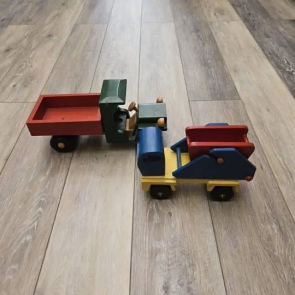 2 vintage Romania toy wooden trucks colorful, moving parts collectible